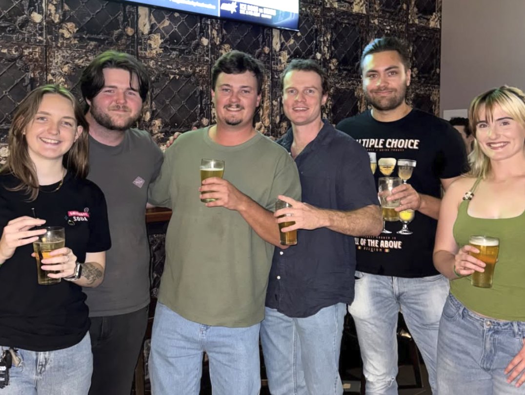 Mates with a beer in hand at a Mates Night Out